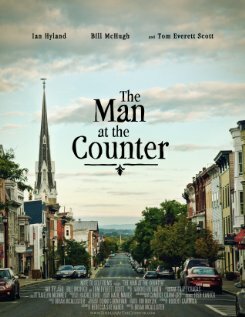 The Man at the Counter (2011) постер